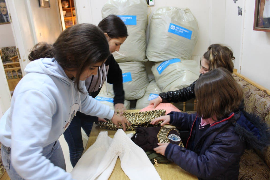 Syrian children from the SOS Children's Village Damascus donate for the earthquake victims in Aleppo