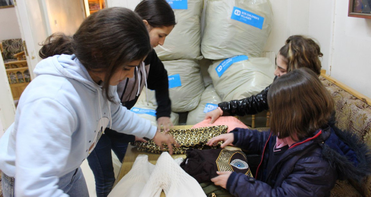 Syrian children from the SOS Children's Village Damascus donate for the earthquake victims in Aleppo
