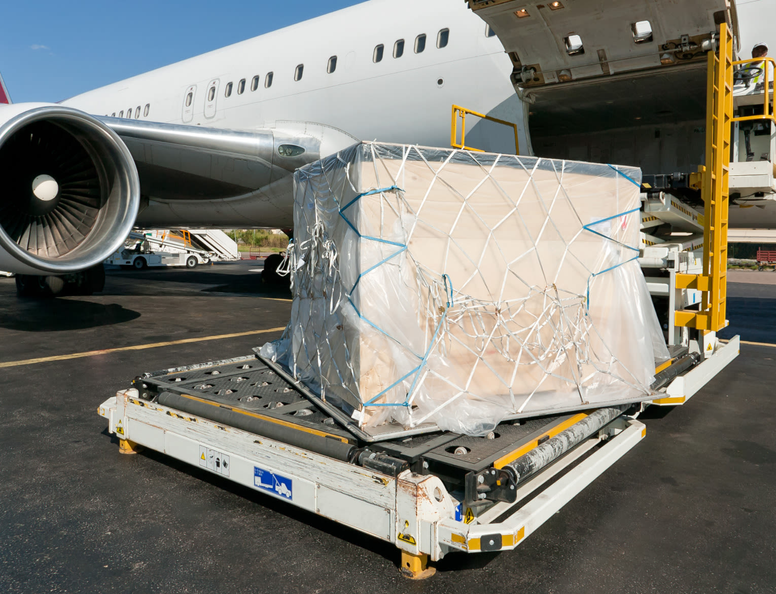 Cargo being loaded onto an airplane