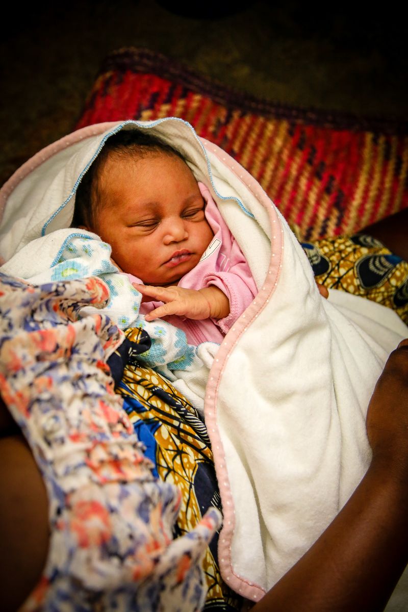 The First Hello: 15 Photos of New Mums Living in Poverty