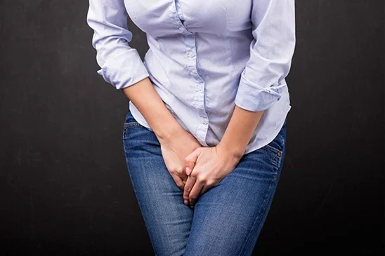 A woman trying to hold her bladder