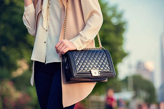 Photo of a woman carrying a purse