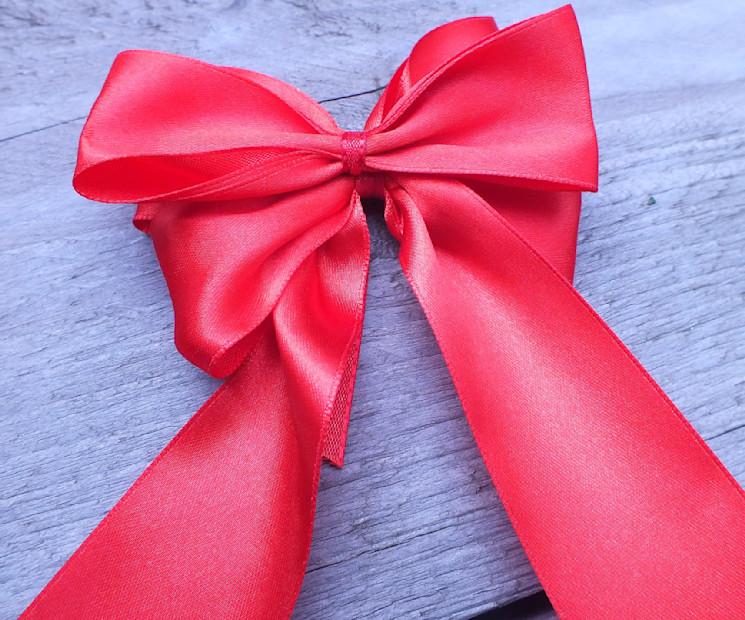 Geschenkschleife binden