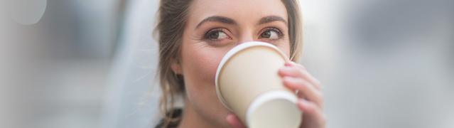 Listerine's on the go causes of bad breath - woman drinking coffee