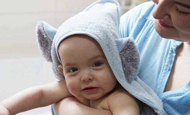 Mom and baby during bath time