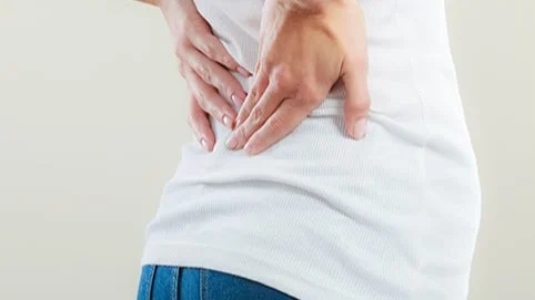 Lady dealing with back pain