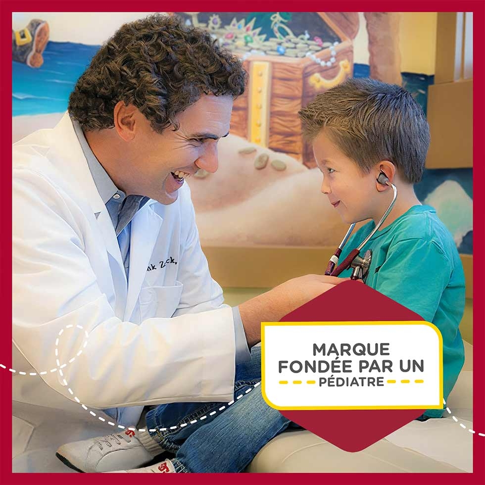 Mention « Marque fondée par un pédiatre » avec une photo du pédiatre Zak Zarbock tenant dans sa main un stéthoscope en souriant à un petit garçon.