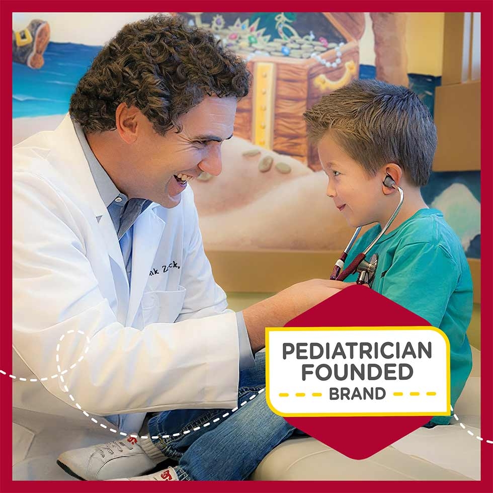 Pediatrician Dr. Zak Zarbock holding a stethoscope and smiling at a little boy with a statement saying 'Pediatrician founded brand'