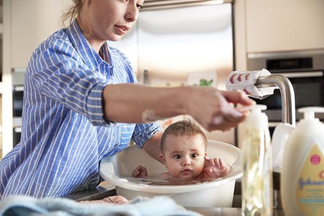 Washing baby skin with Johnson's baby wash