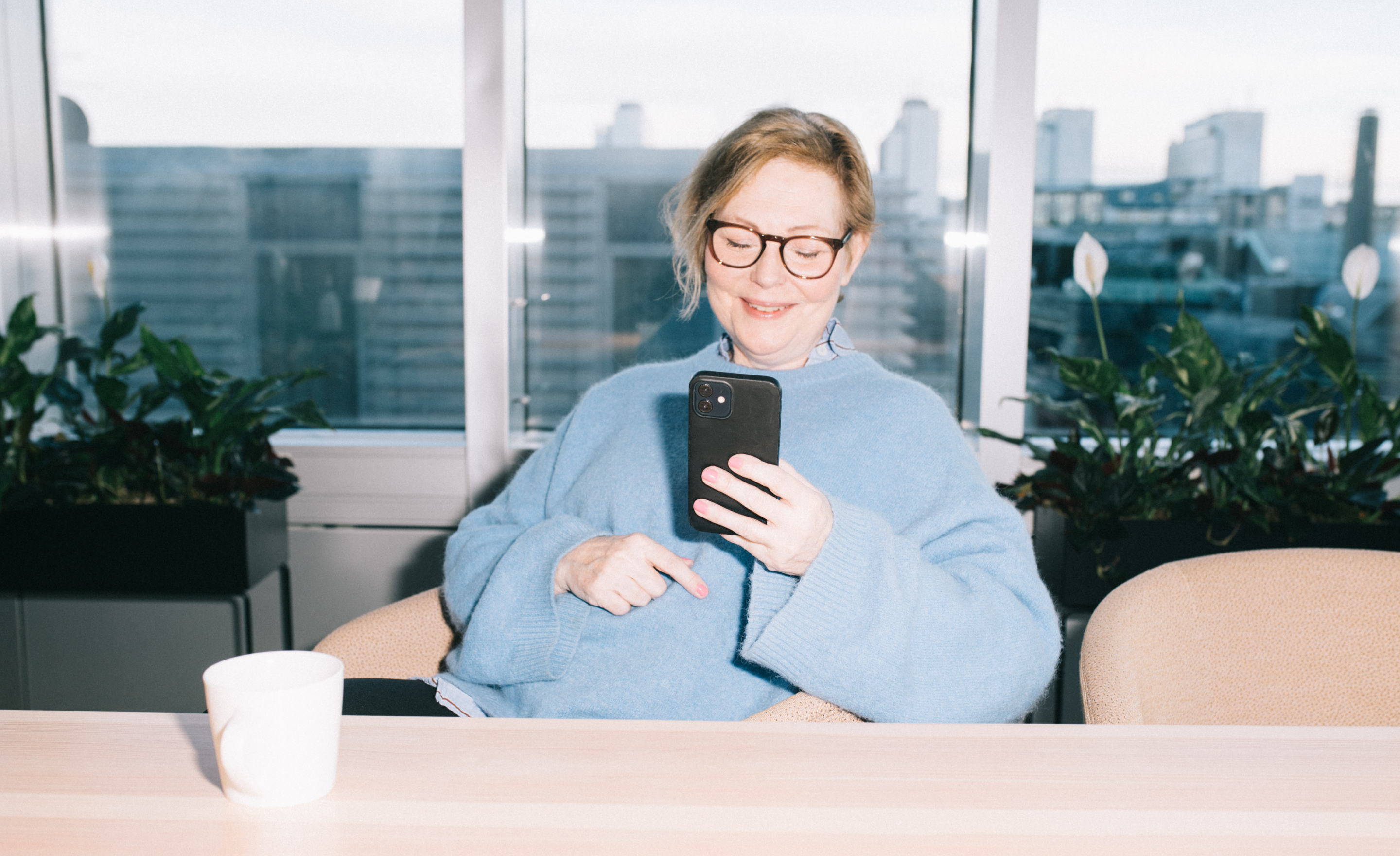 A person using their mobile phone