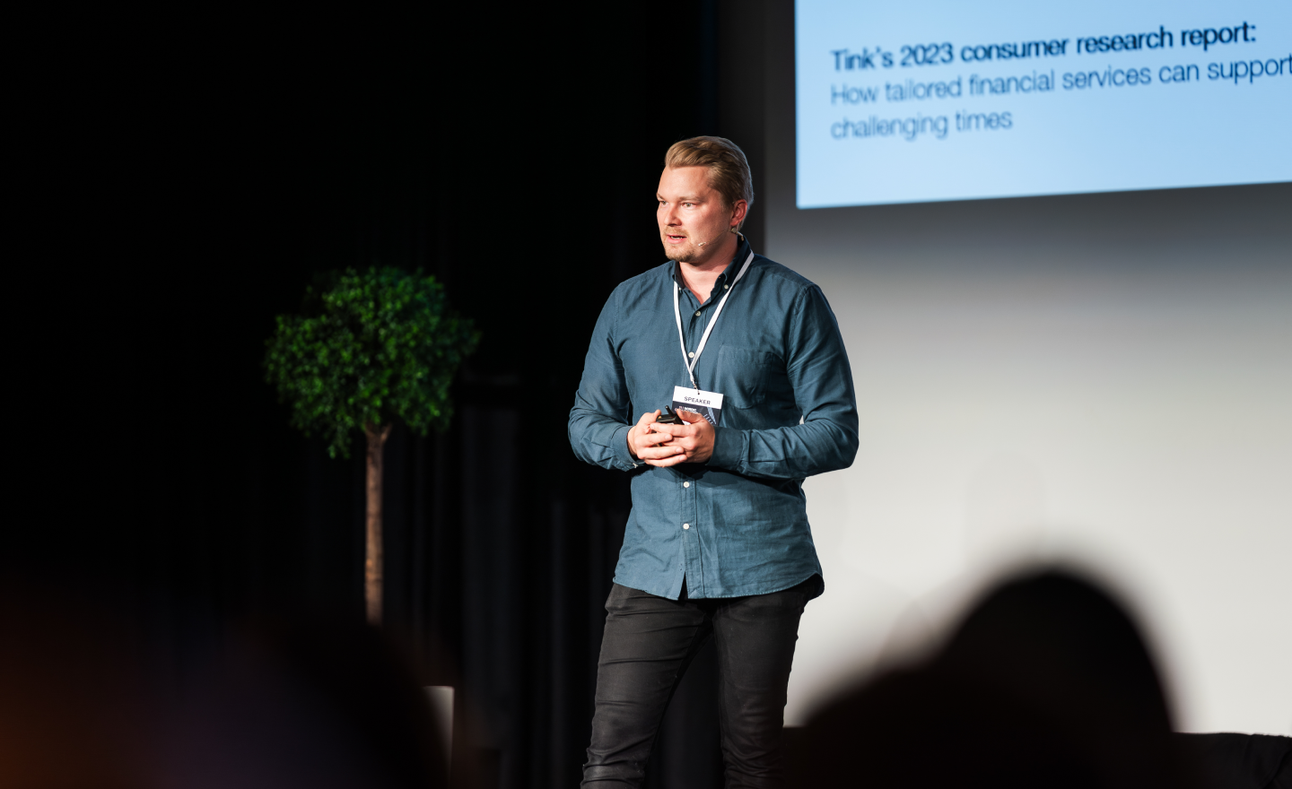 This image depicts Vesa Moisio speaking on stage at the 2023 Nordic Banking Forum in Helsinki.