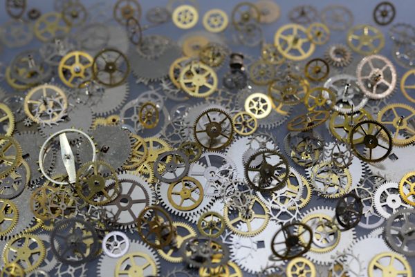Cogs scattered over a surface