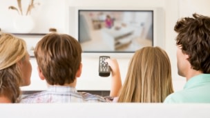 Family watching TV