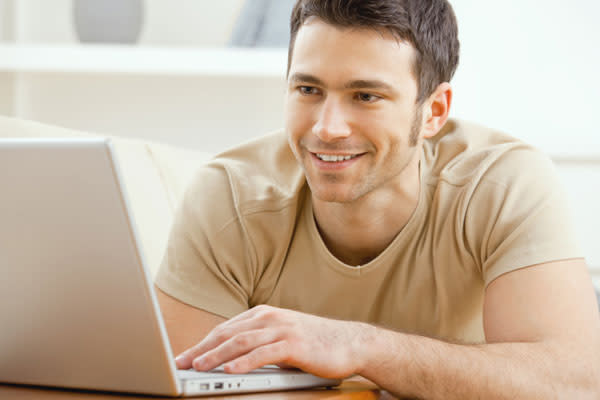 man using laptop
