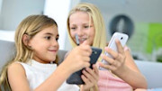 Kids using smartphones