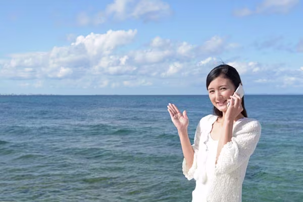 Using a smartphone on the beach