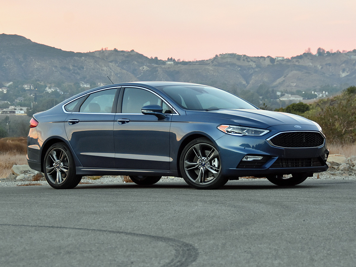 https://images.ctfassets.net/c9t6u0qhbv9e/2018FordFusionTestDriveReviewsummary/15a029a571f42dfb339fe28600f3b627/2018_Ford_Fusion_Test_Drive_Review_summaryImage.jpeg