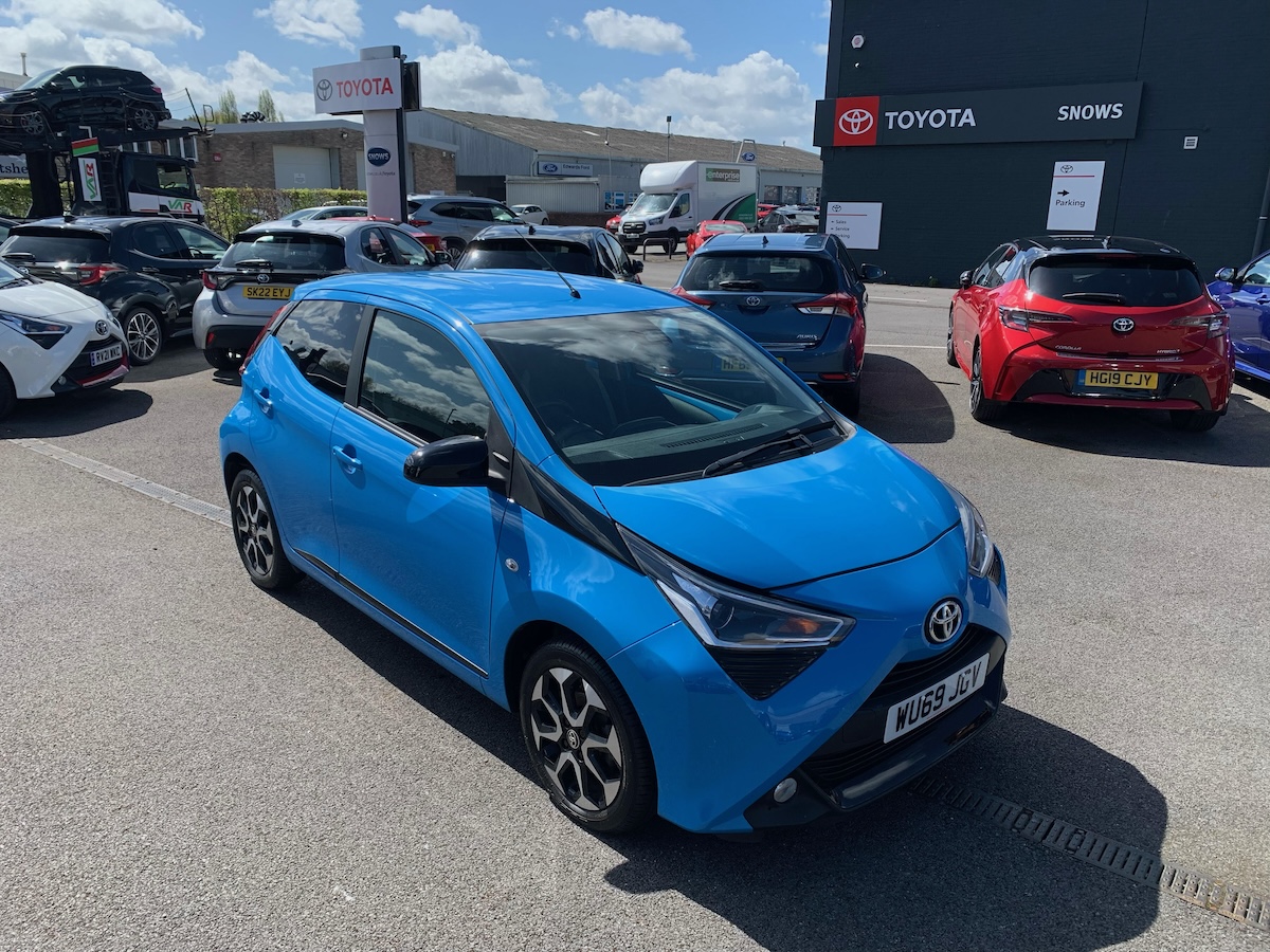Toyota Aygo blue front static at dealership