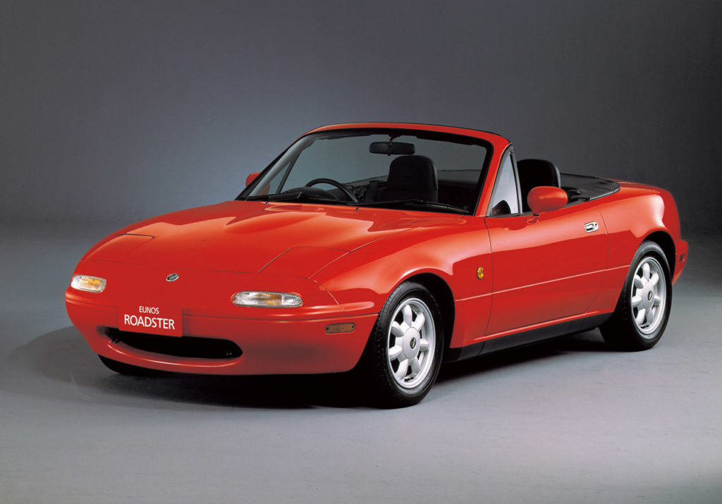 Automotive Reincarnations: MG MGB Roadster and Mazda MX-5 Front Side View 1
