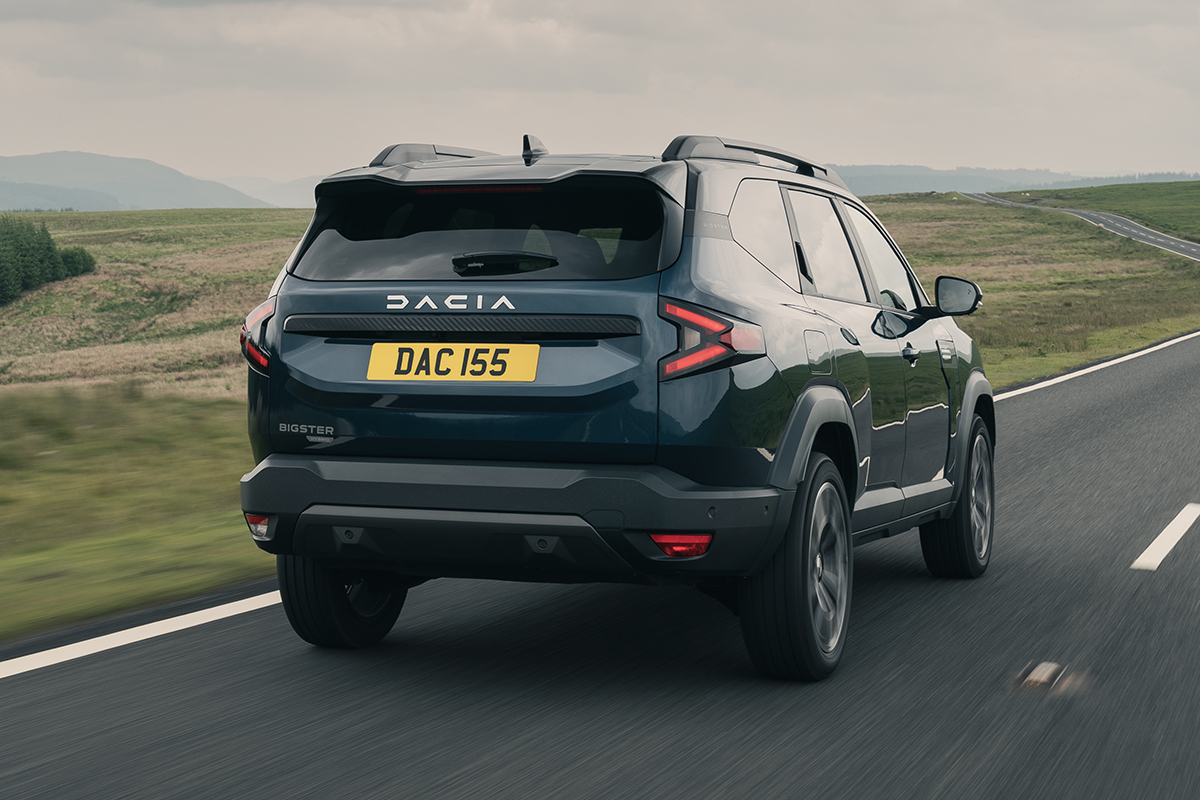 Dacia Bigster review dark blue rear driving