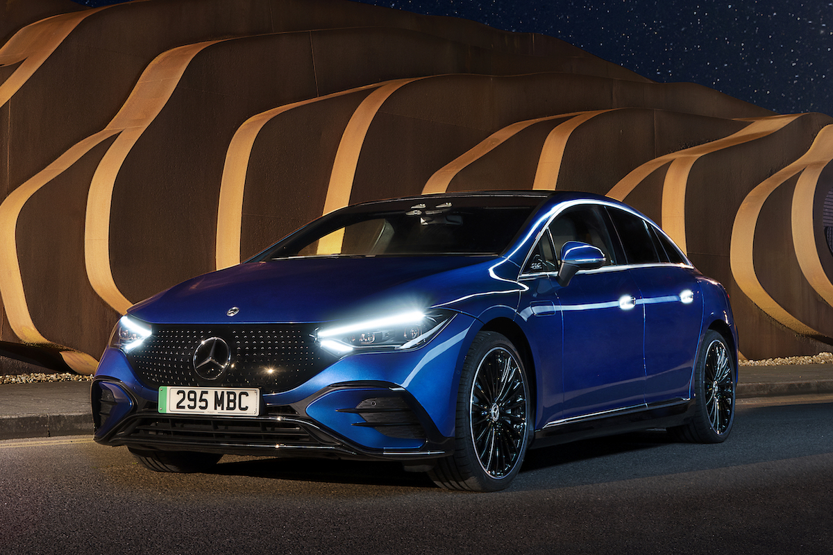 Mercedes-Benz EQE 350 front driving sunset