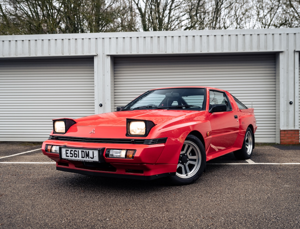 Mitsubishi Starion coupe front red static pop up headlights