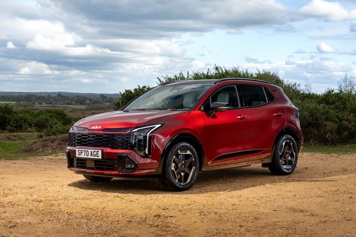 2025 Kia Sportage review red front three quarter driving