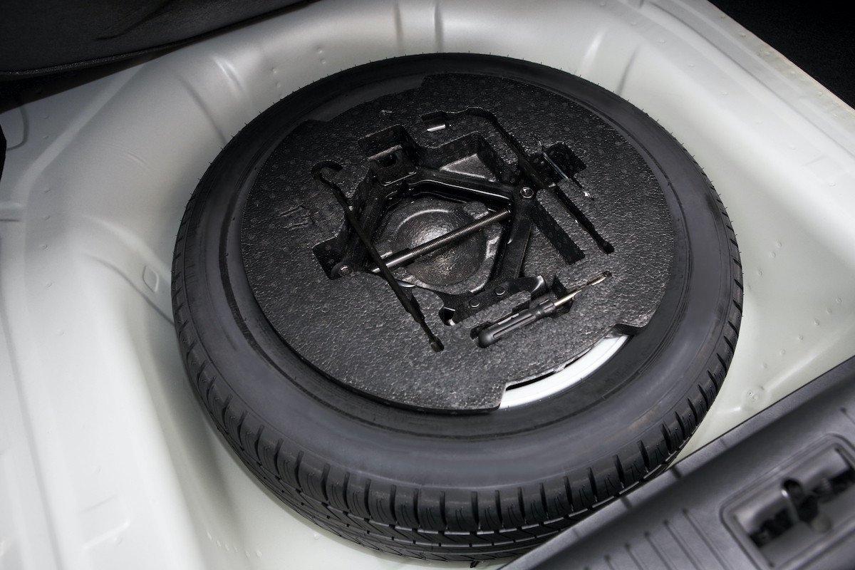 Car spare tire in wheel well