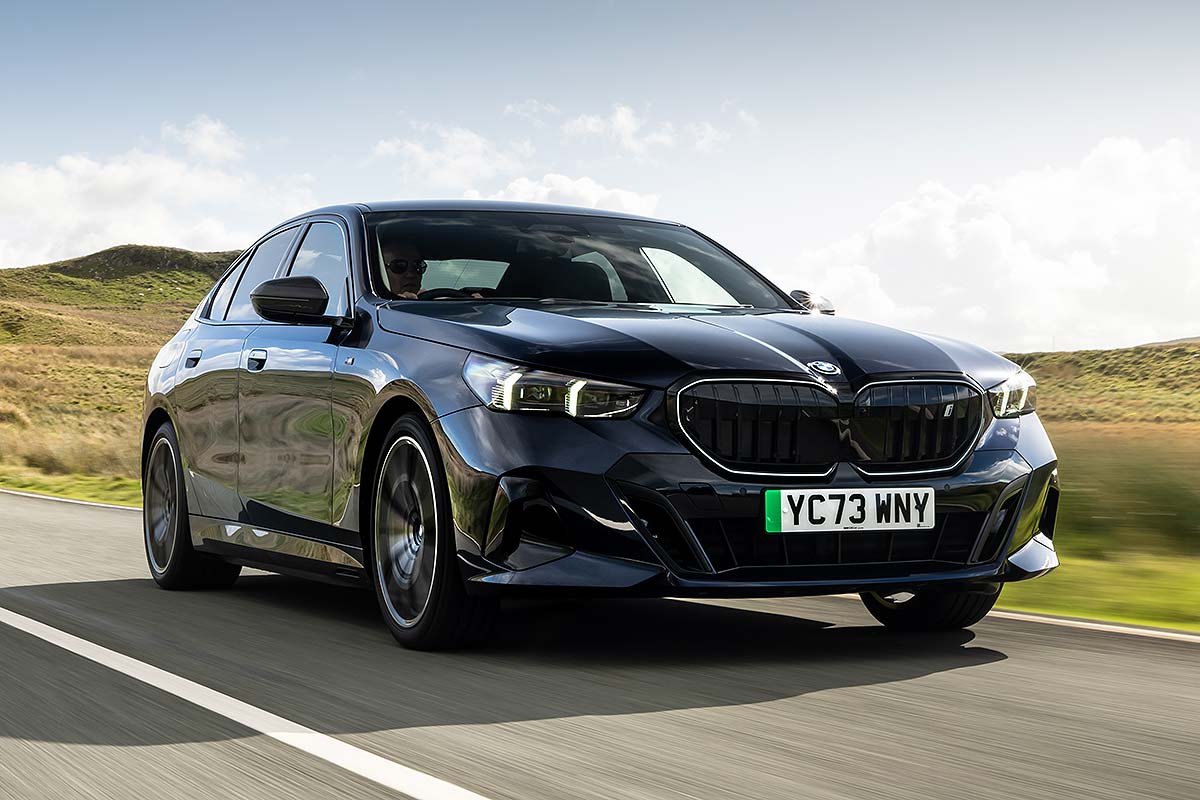 2026 BMW i5 blue front driving