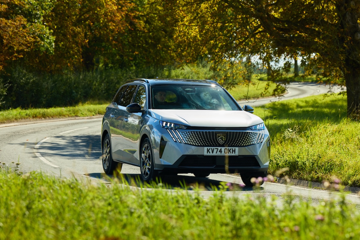 Peugeot 5008 driving on a road