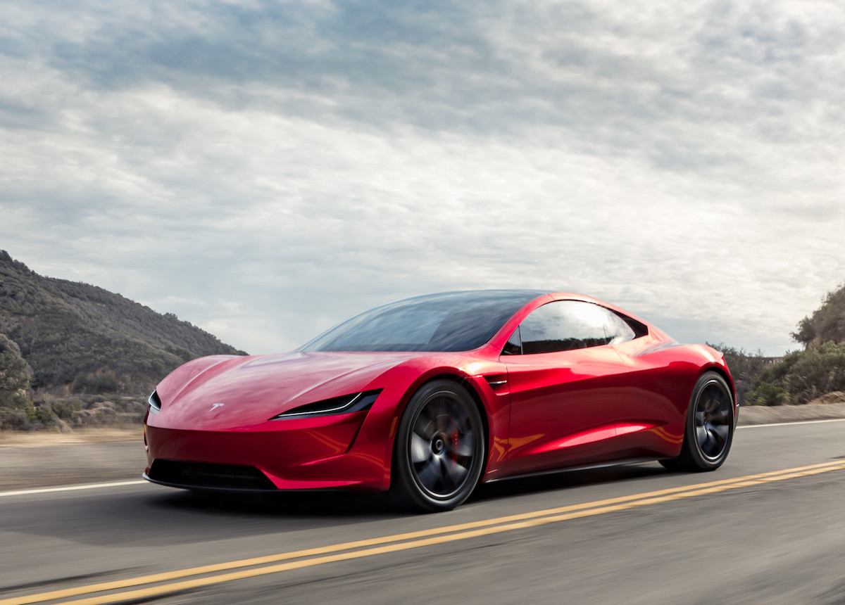 Tesla Roadster front driving red