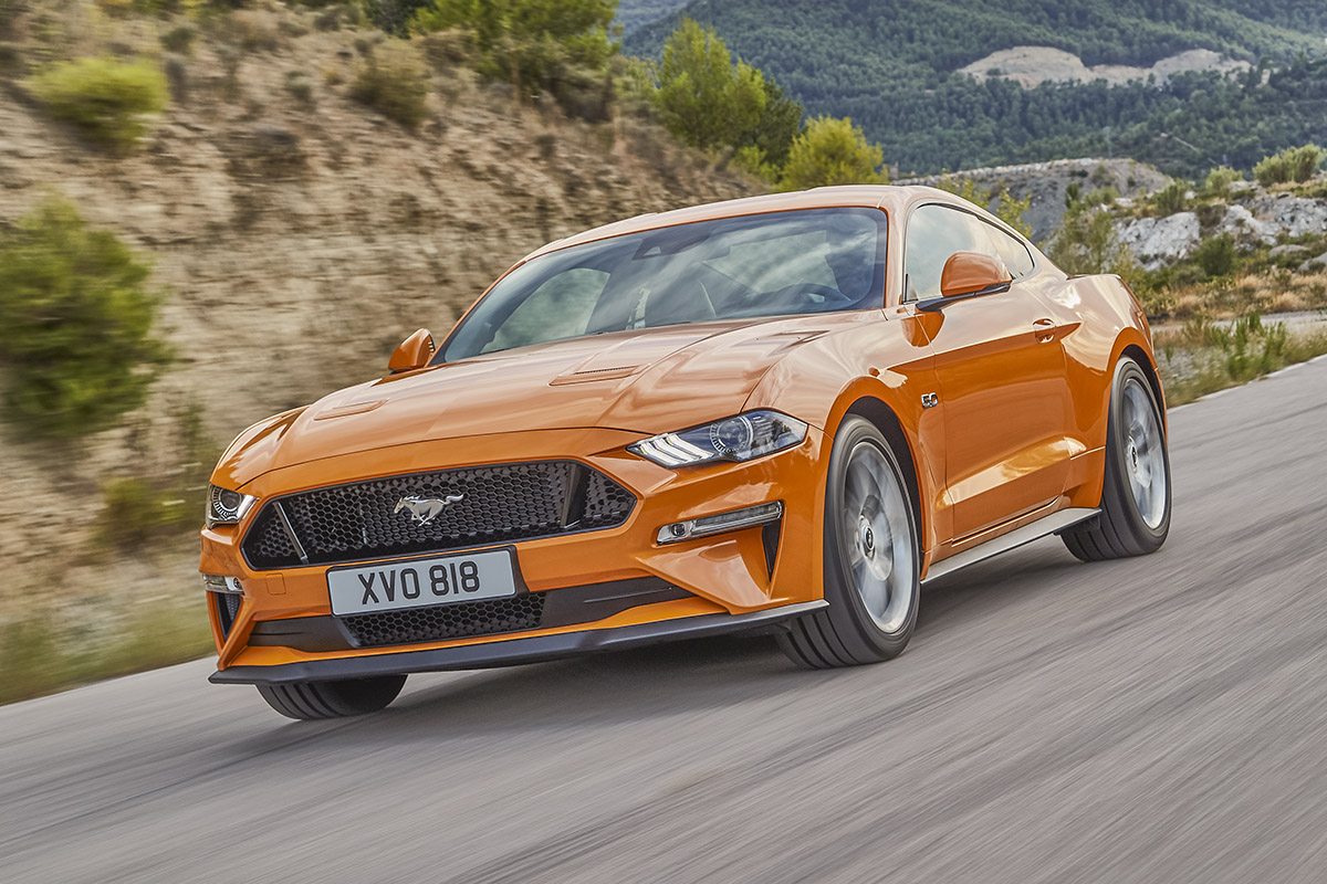 Ford Mustang front driving orange