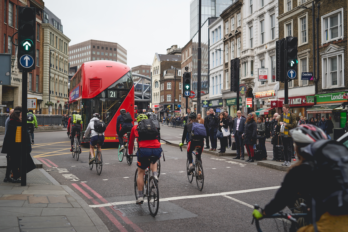 ULEZ cyclists and bus in London