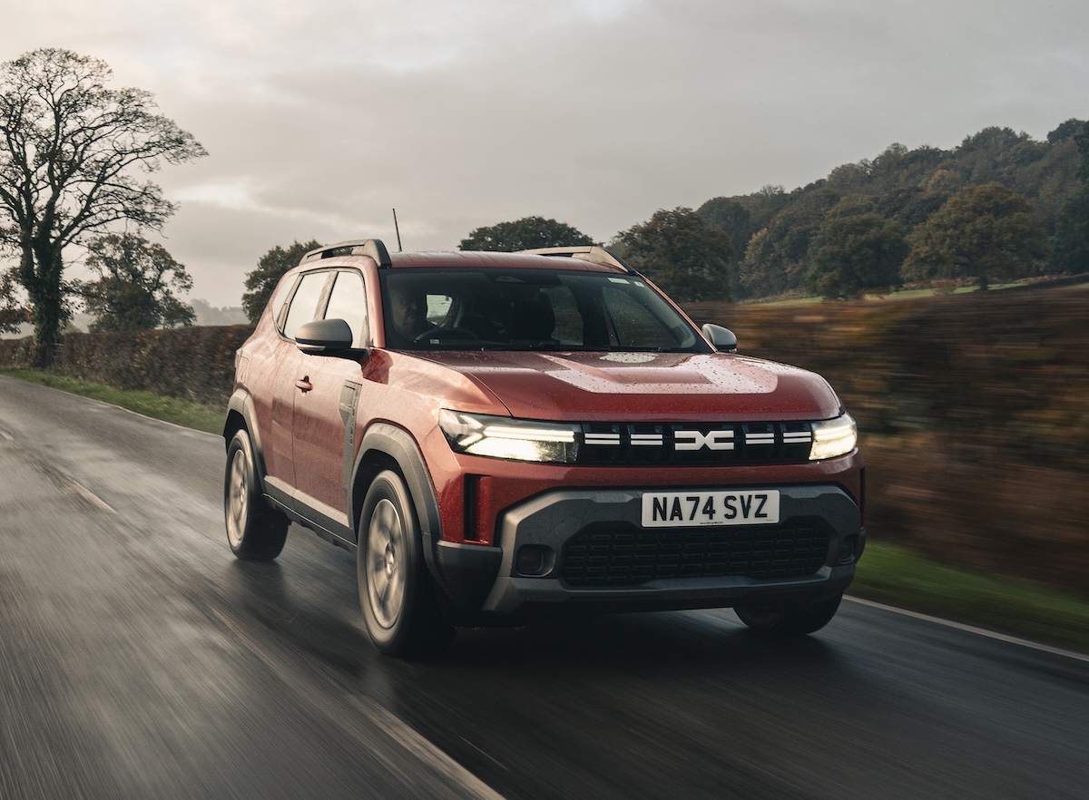 2025 Dacia Duster review red front driving