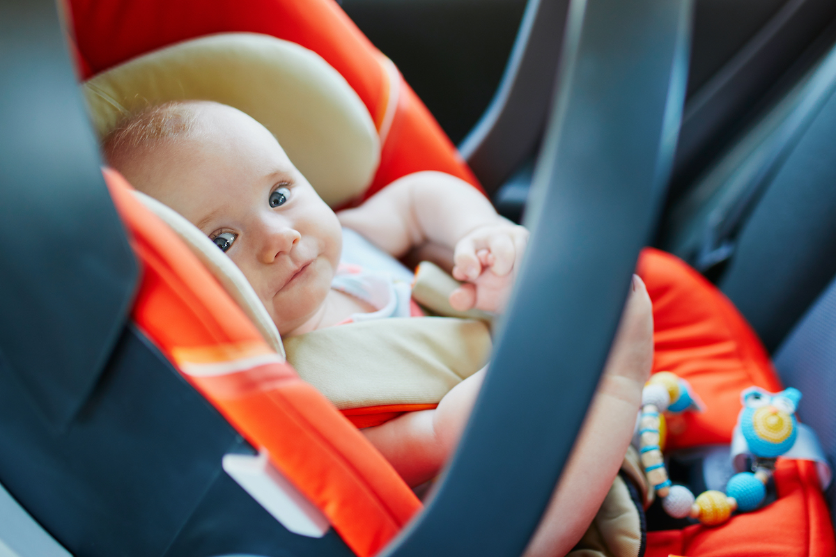 Baby in car seat rear facing