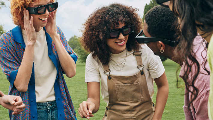 Group of friends interacting with Spectacles.