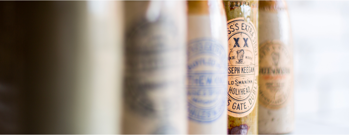Line up of old Guinness bottles from the Guinness Archive collections.