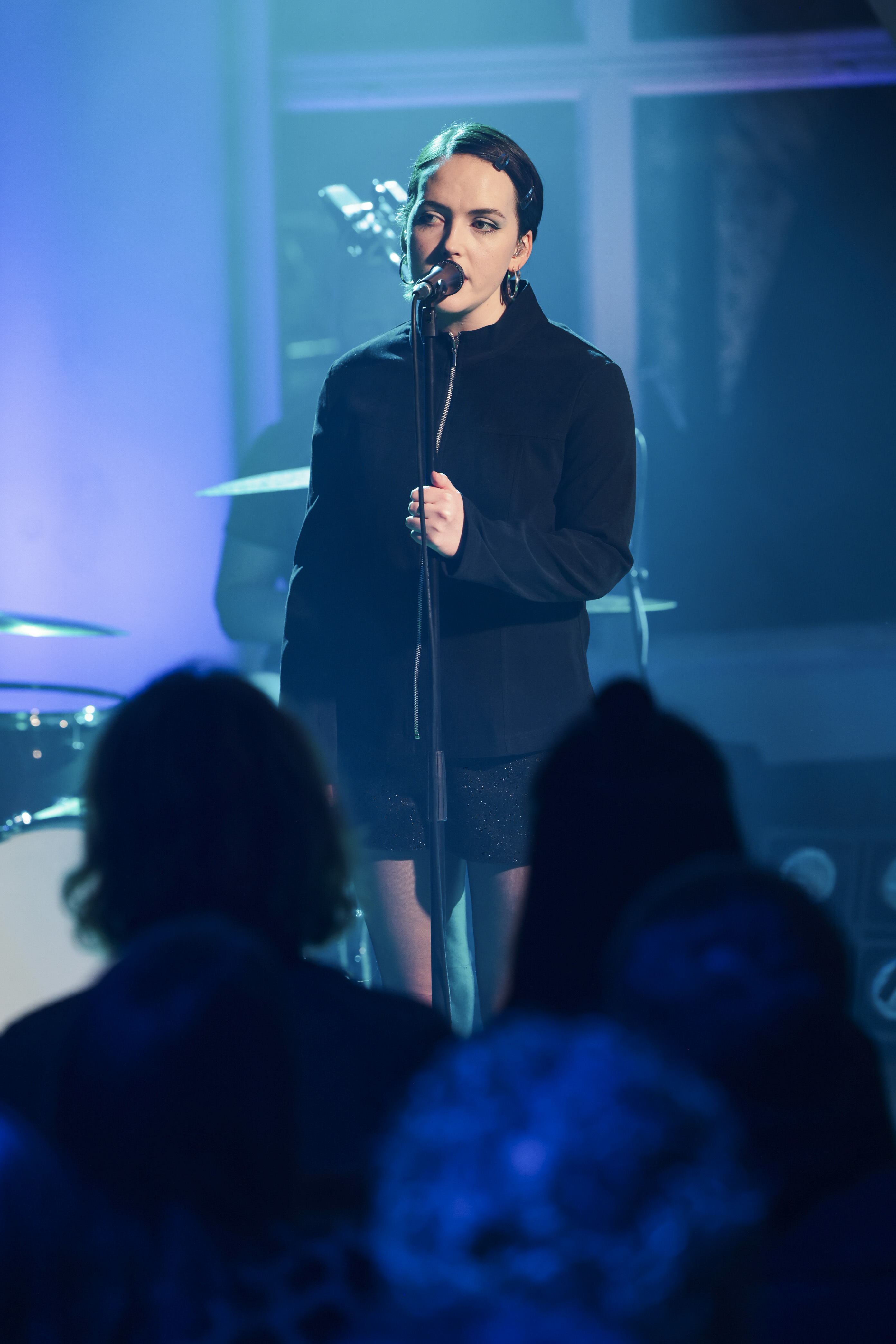A female singer performing at Other Voices