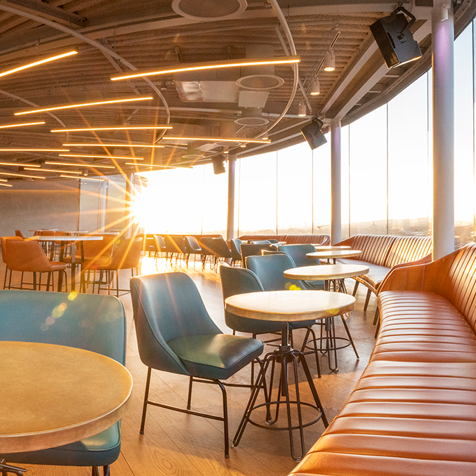 The Gravity bar of the GUinness Storehouse, empty, with sunlight streaming through the windows