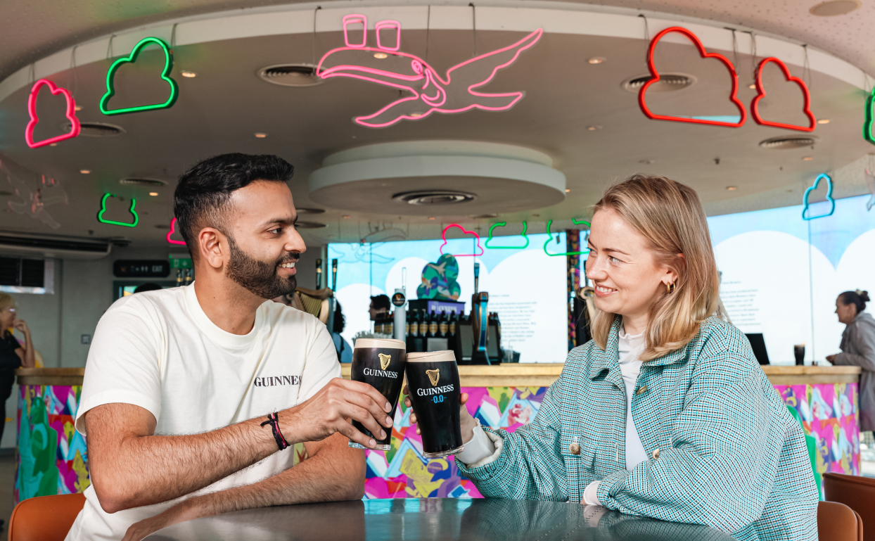 The Gravity bar full and busy with people enjoying drinks, surrounded by plants