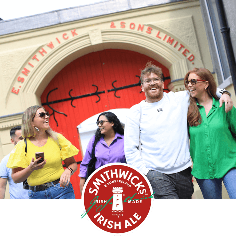 Five happy visitors outside Smithwick’s Experience
