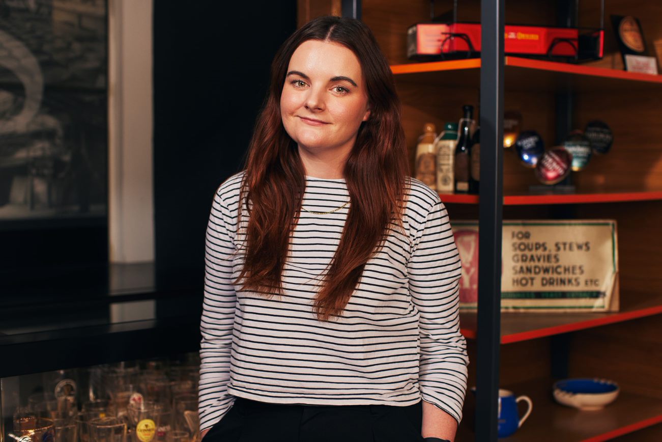 Photograph of Leanne Harrington, Digital Archivist, in the Guinness Archives Research Room.
