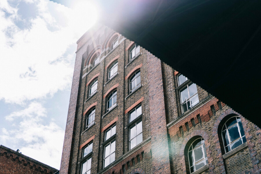 A picture of Guinness storehouse building on a sunny day