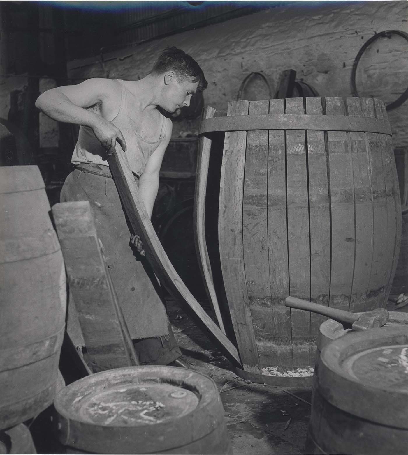 Cooper working with a cask.
