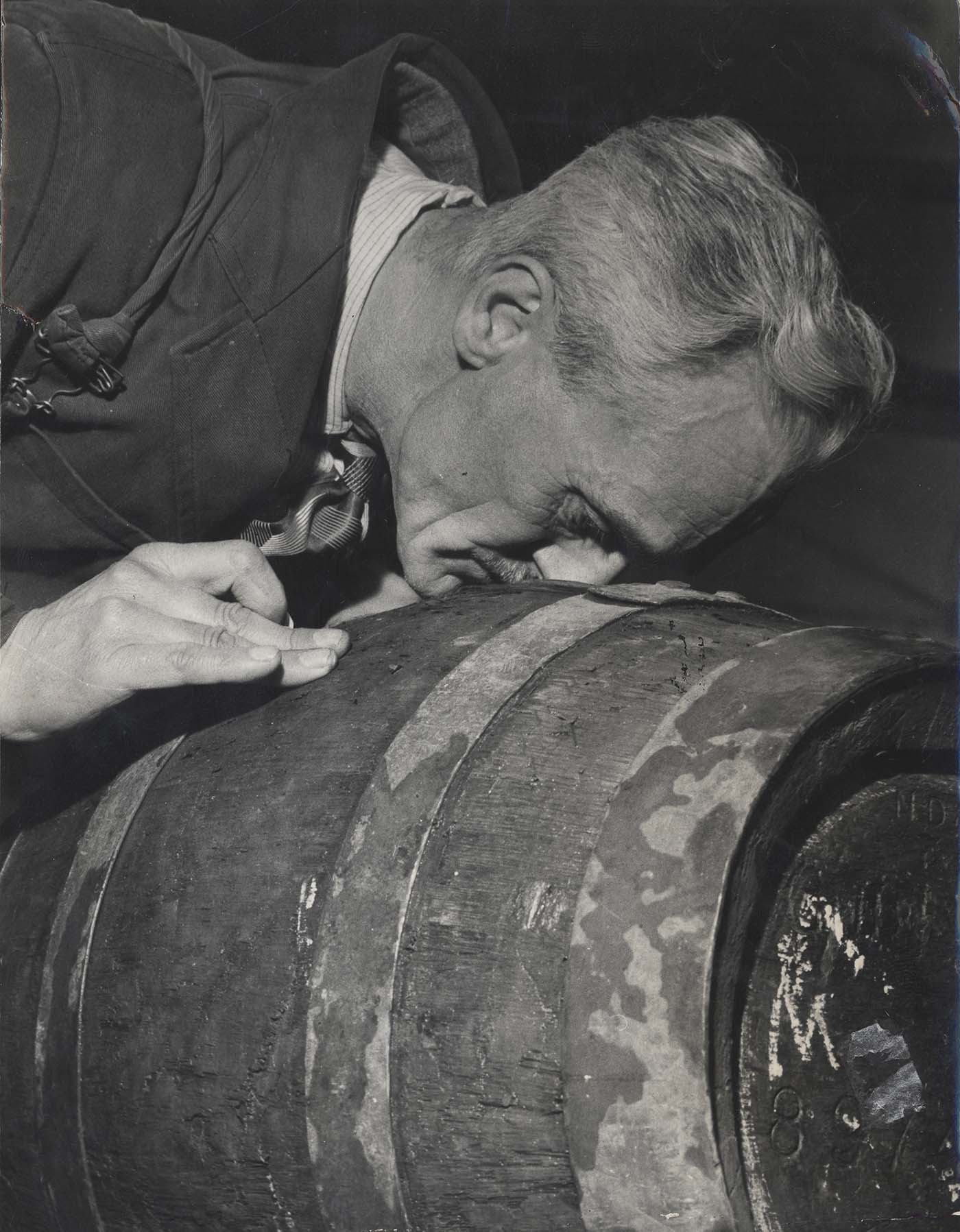Smeller investigating a cask.