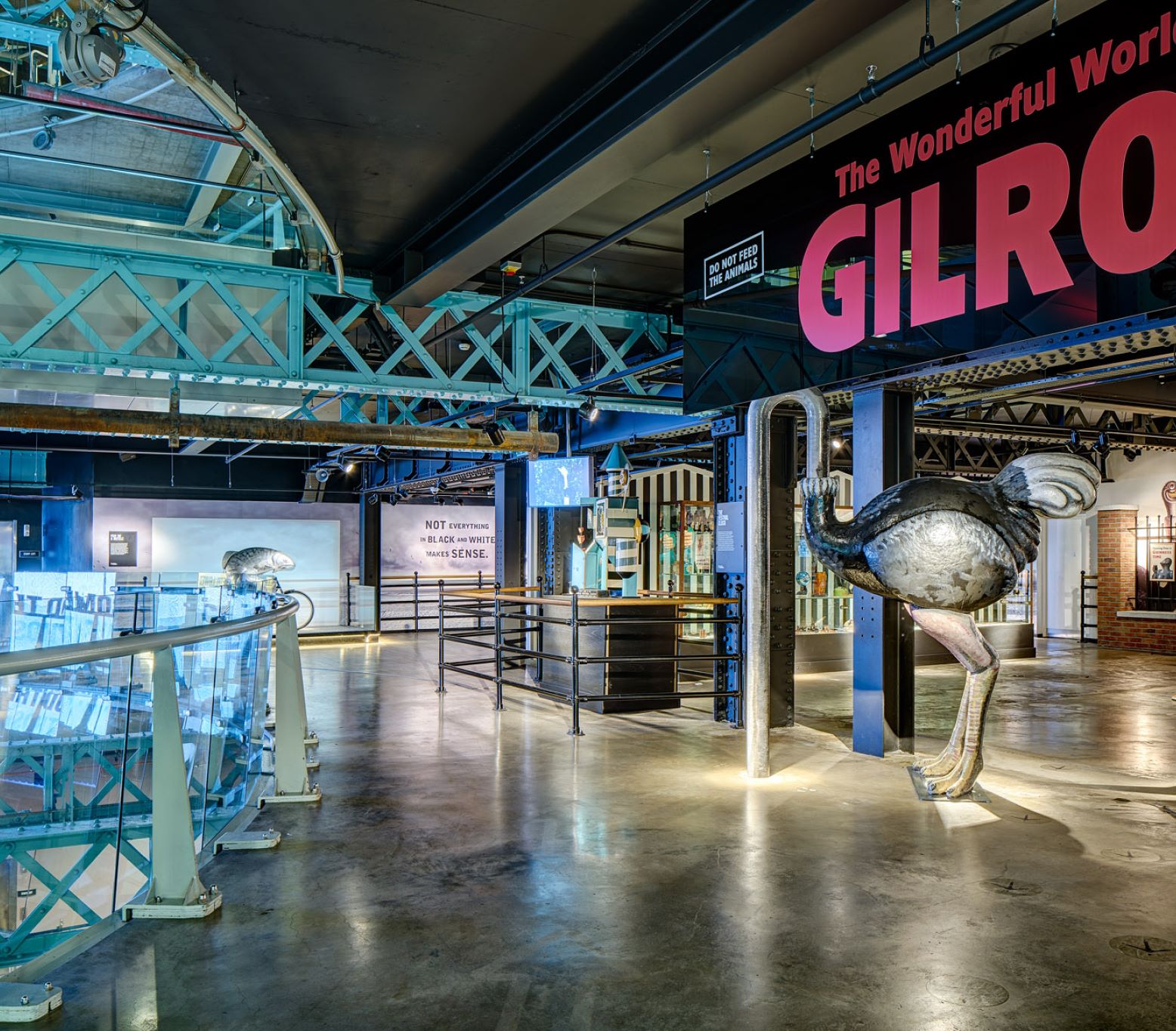 People silhouette in front of large cinema screen