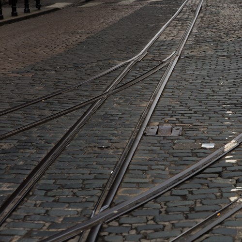 An image of the narrow-gauge track on the cobble stoned street at St. James’s Gate.