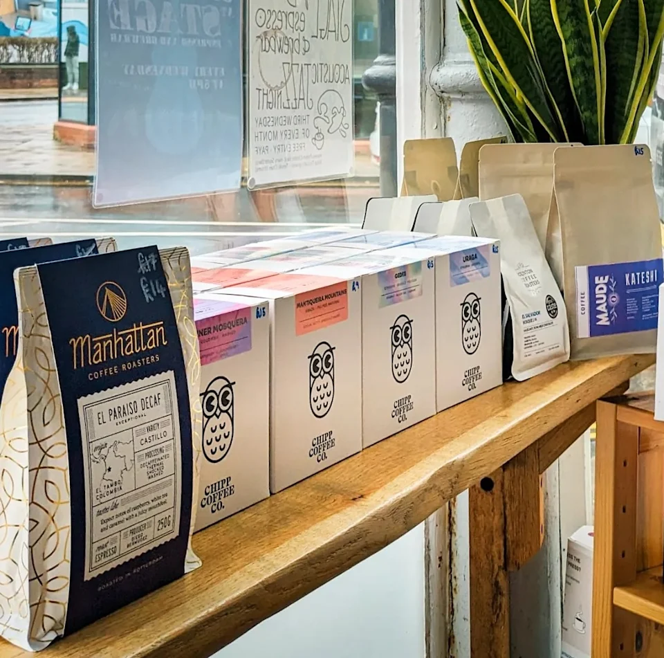 Coffee and brewing equipment on the retail shelves at Stage