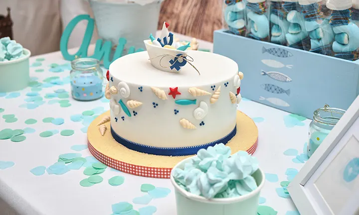 Nautical sailboat baby shower cake