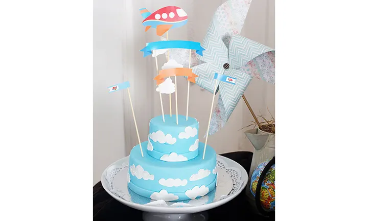 Blue skies and clouds baby shower cake